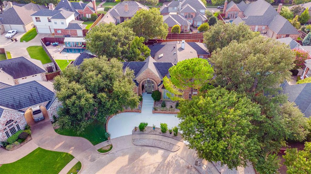 an aerial view of residential house with outdoor space and street view