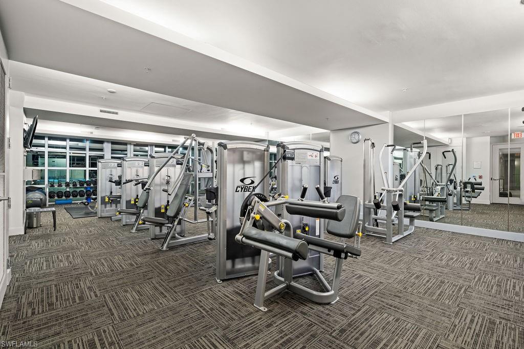 3000 Oasis Grand Boulevard, Unit 2007 Fort Myers, FL 33916 - Photo 43 of 45 a view of a room with gym equipment