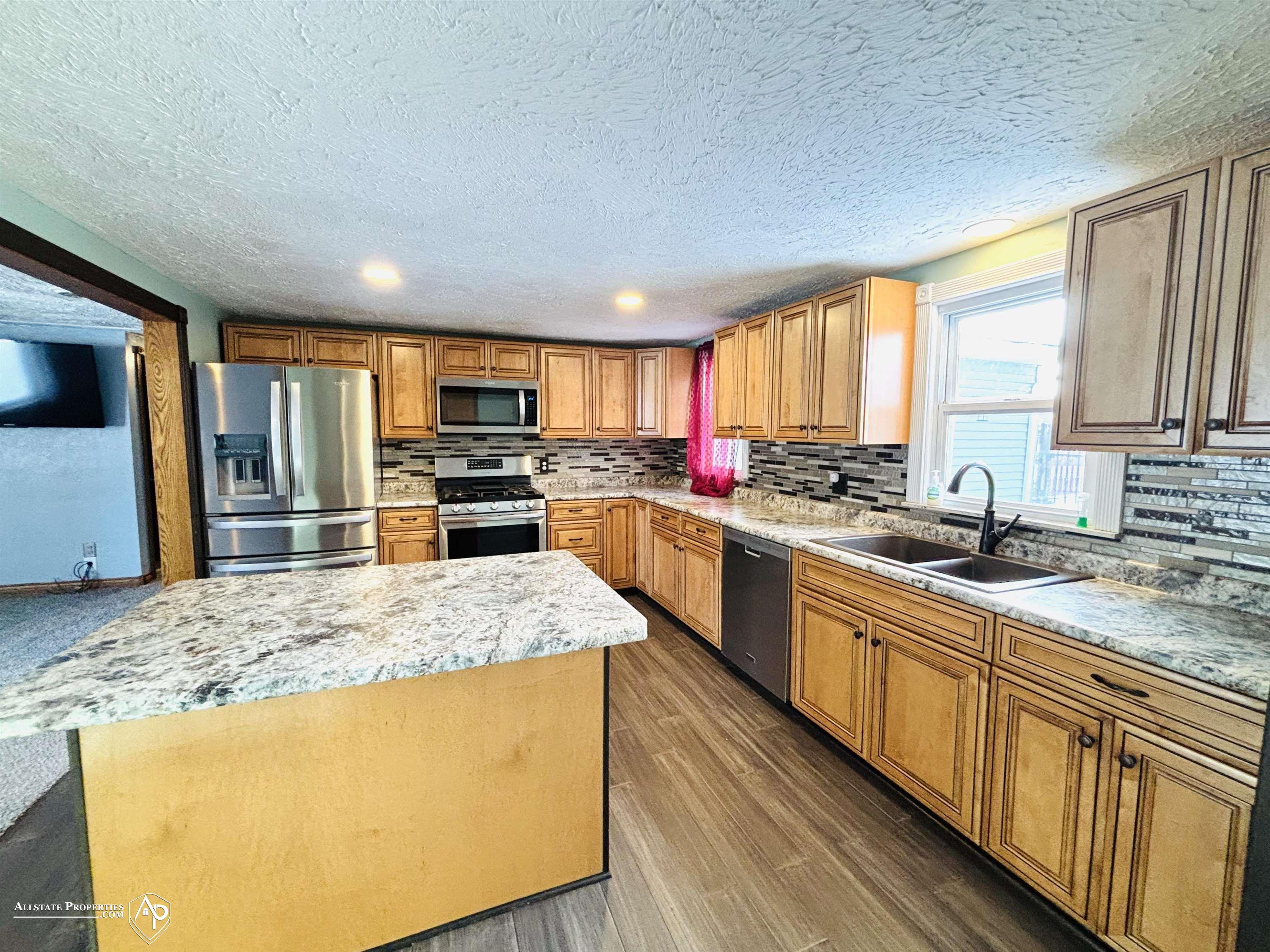 6304 Lapeer Road Burton, MI 48509 - Photo 4 of 24 50196076-37c5dfb9-9dae-482a-95b5-4c5b8ee458a8.JPG