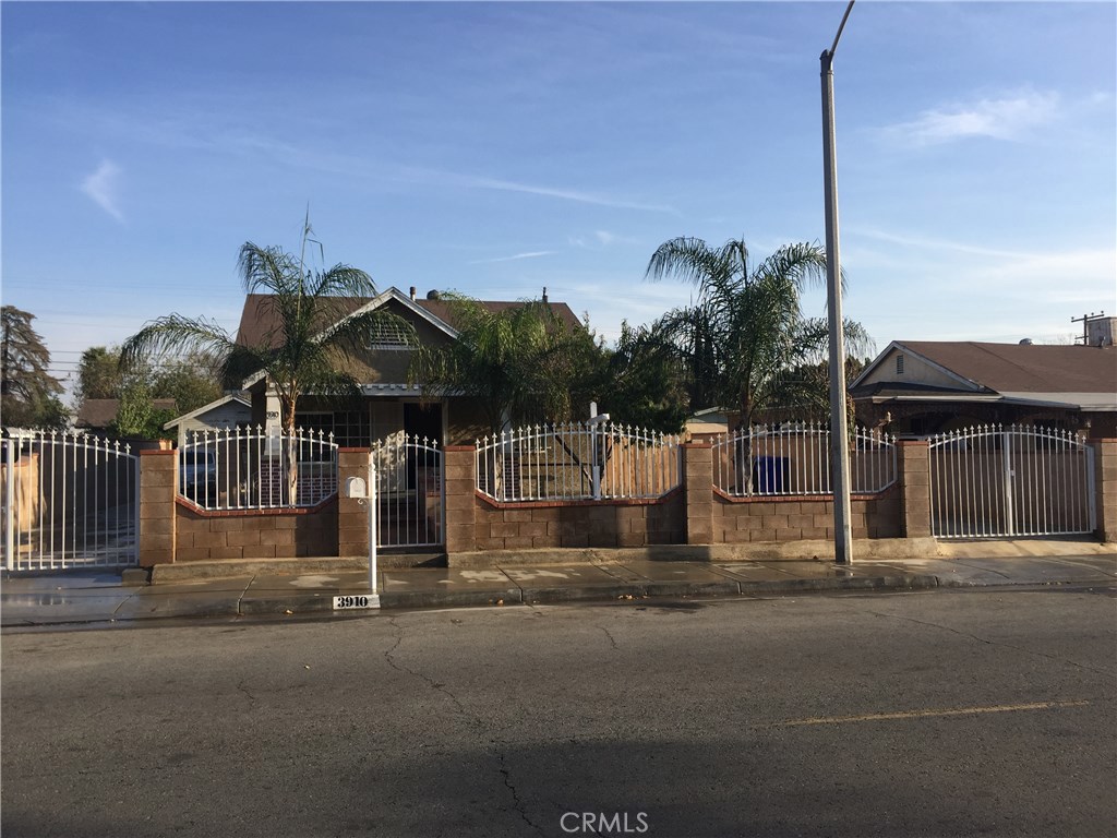 3910 Pontiac Avenue Riverside, CA 92509 - Photo 1 of 1 a view of a street with houses on the road
