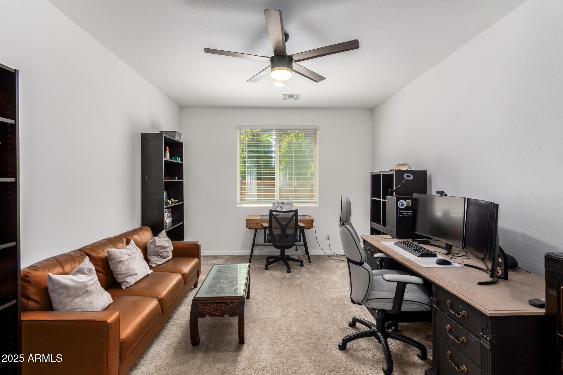 24608 Seed Road Florence, AZ 85132 - Photo 28 of 45 a view of a livingroom with workspace and a window
