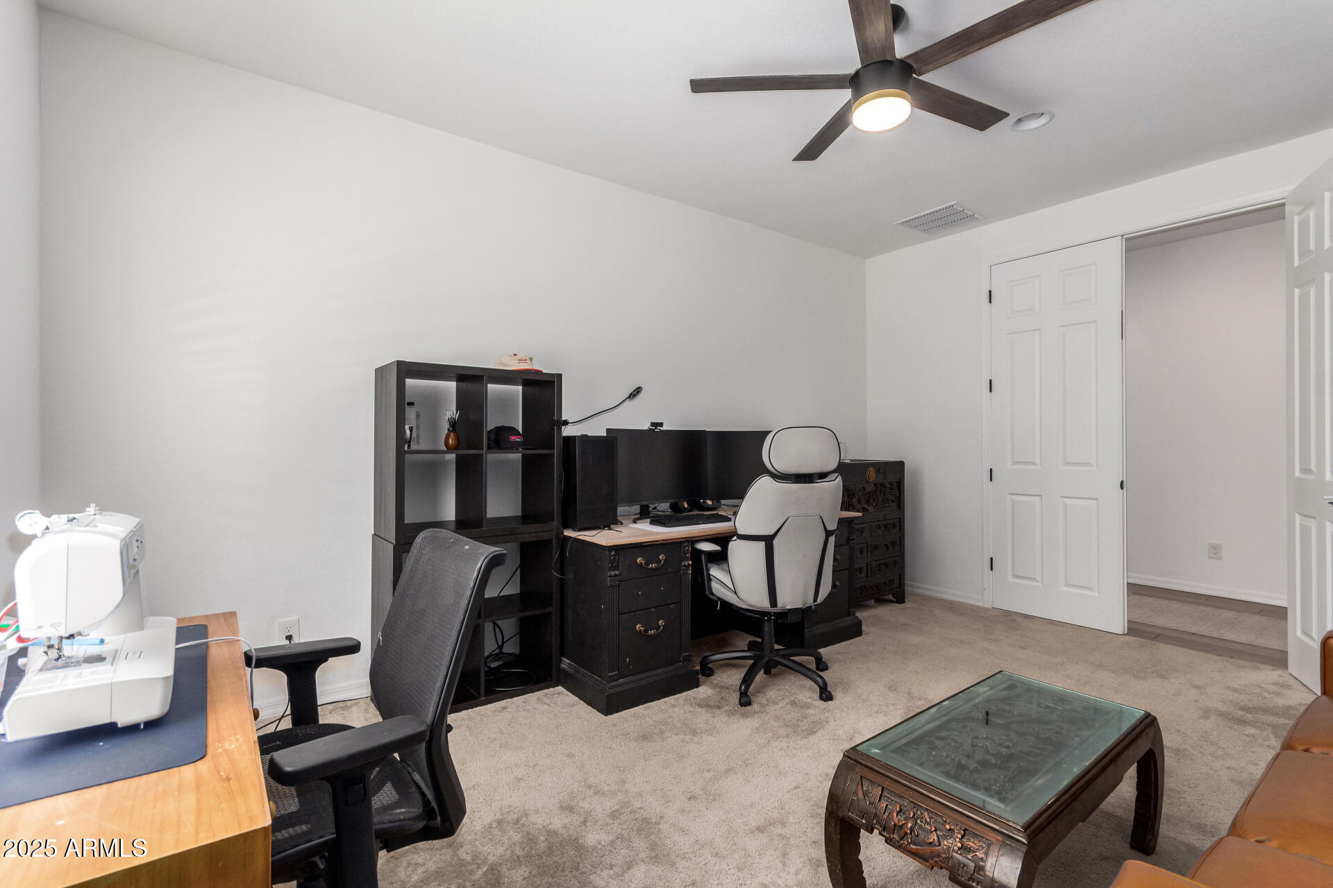 24608 Seed Road Florence, AZ 85132 - Photo 29 of 45 a view of a workspace with furniture