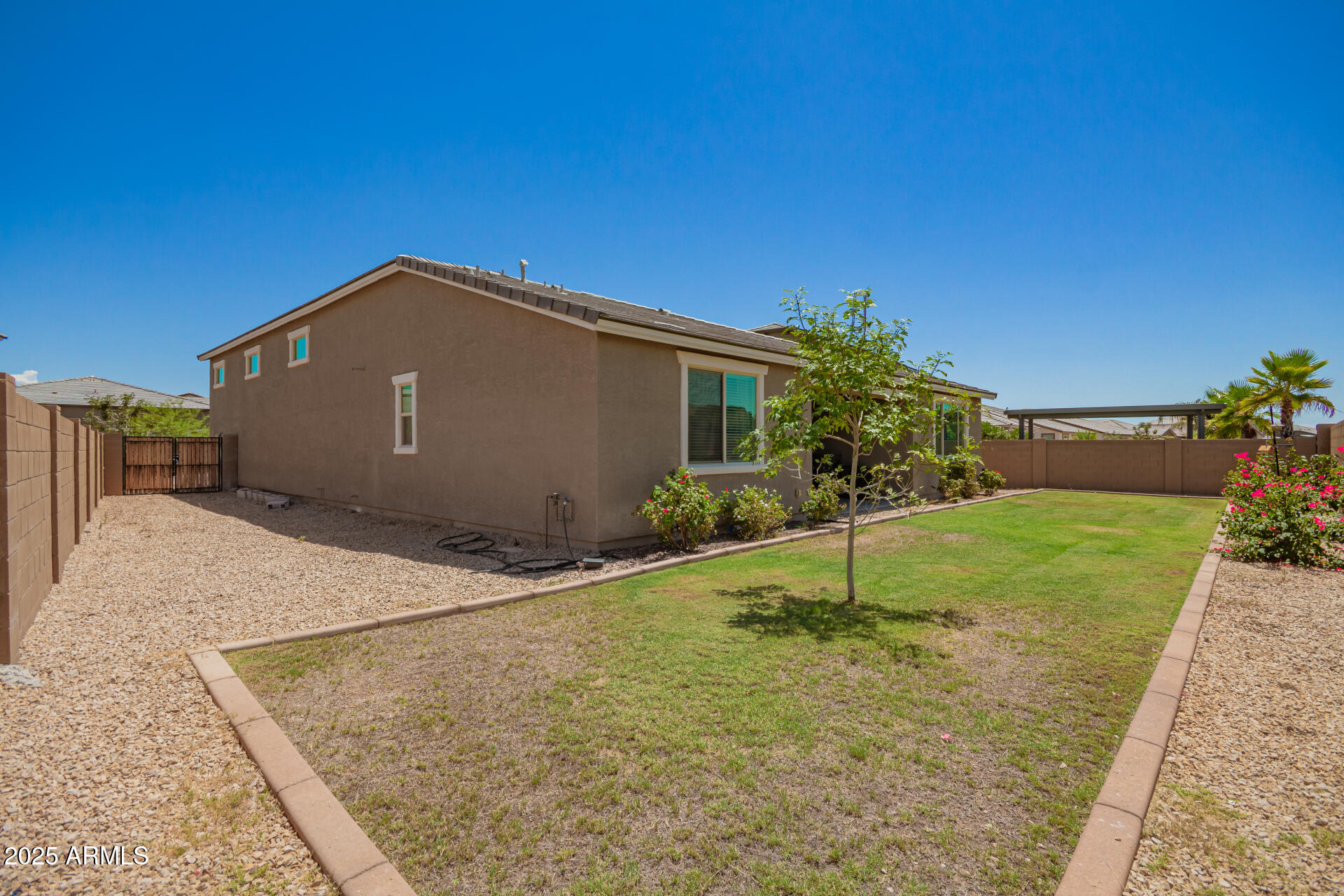 24608 Seed Road Florence, AZ 85132 - Photo 34 of 45 a house view with a backyard space