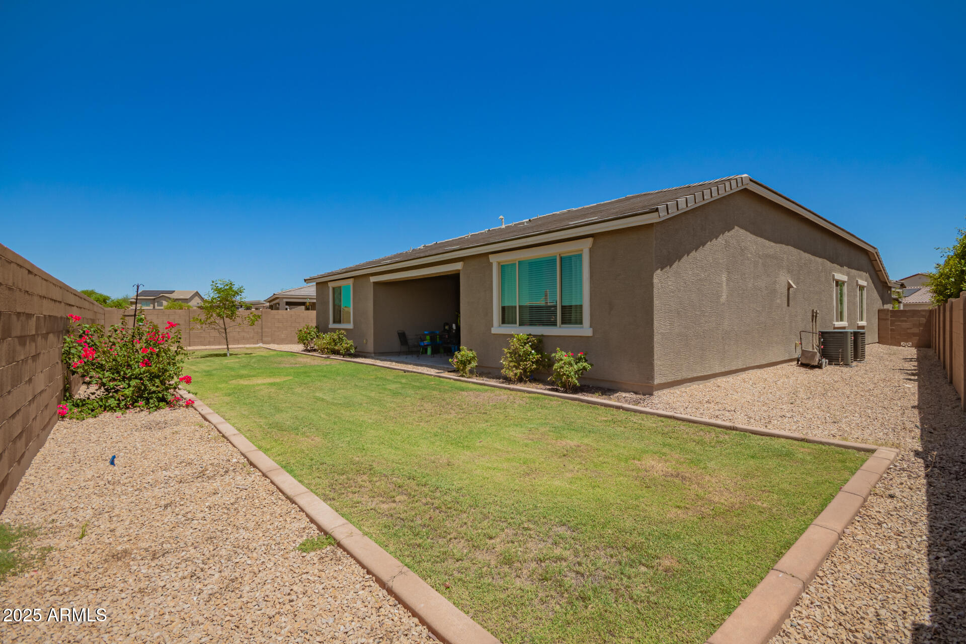 24608 Seed Road Florence, AZ 85132 - Photo 36 of 45 a view of an house with backyard space