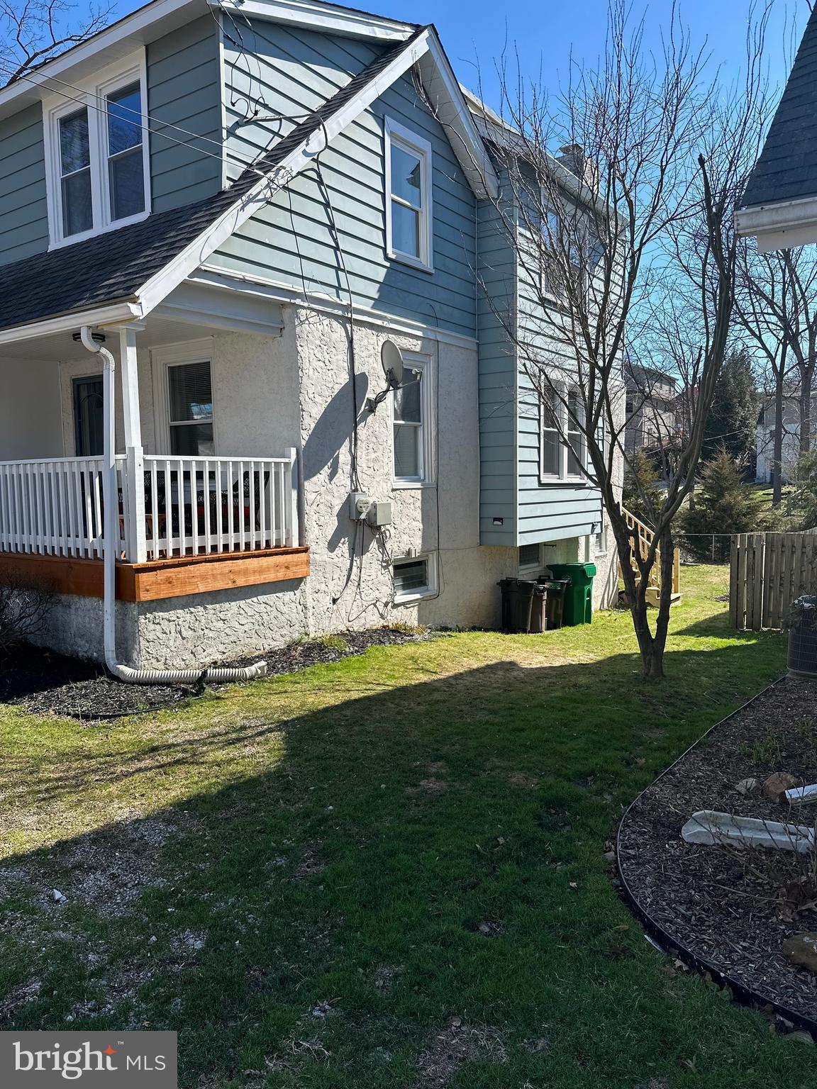 114 West 5th Street, Unit 1 Media, PA 19063 - Photo 11 of 11 a front view of a house with a garden