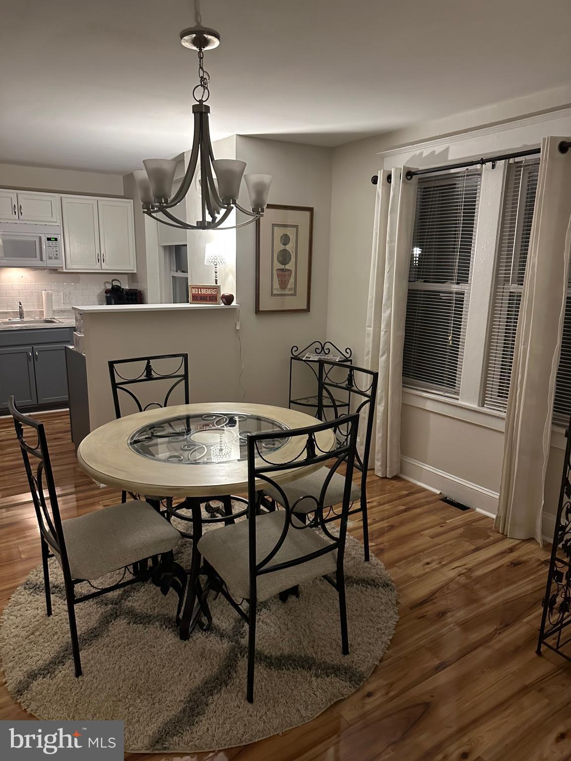 114 West 5th Street, Unit 1 Media, PA 19063 - Photo 4 of 11 a view of a dining room with furniture window and wooden floor