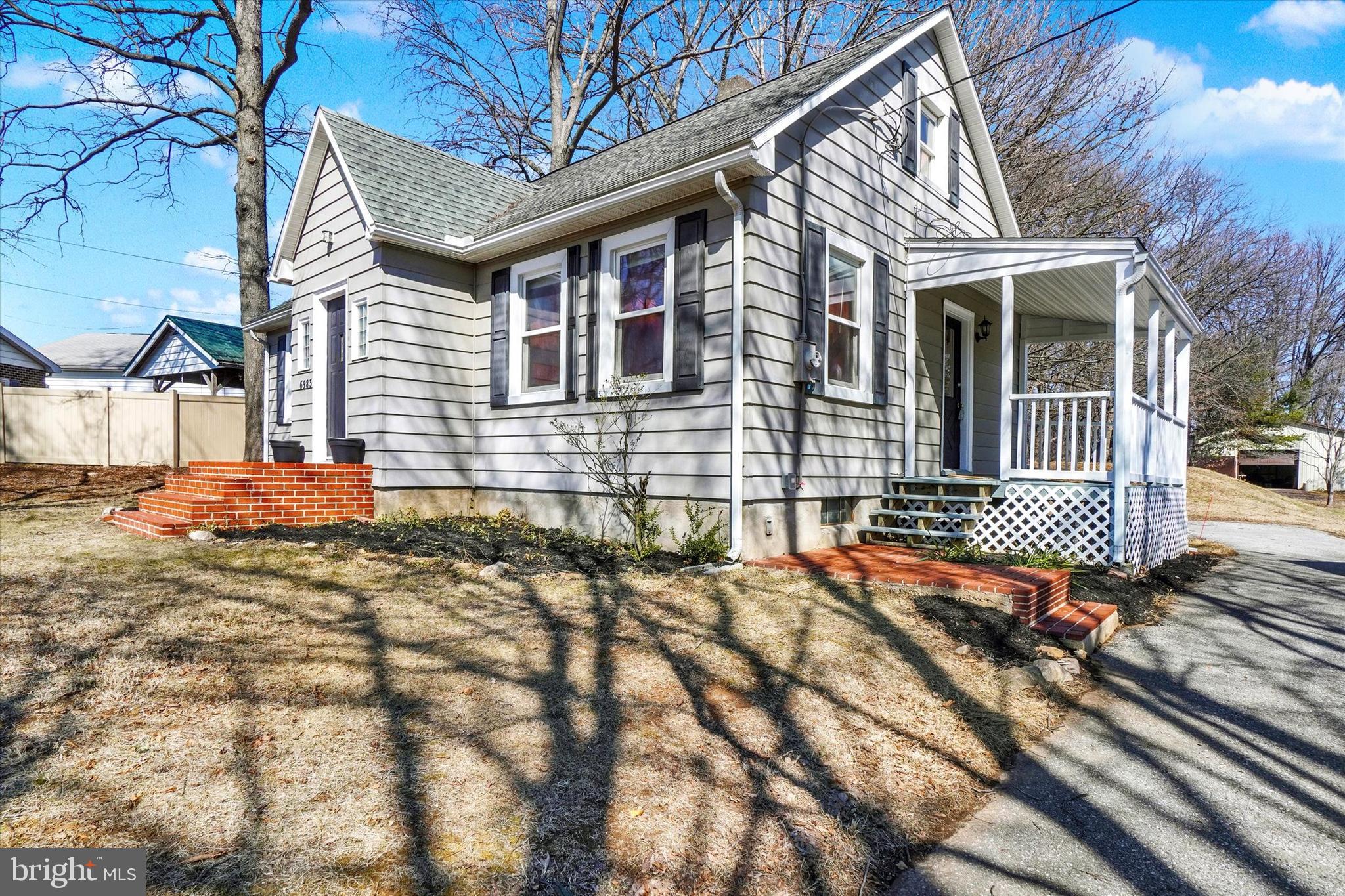 6983 Lake Road York, PA 17403 - Photo 6 of 28 a front view of a house with a yard