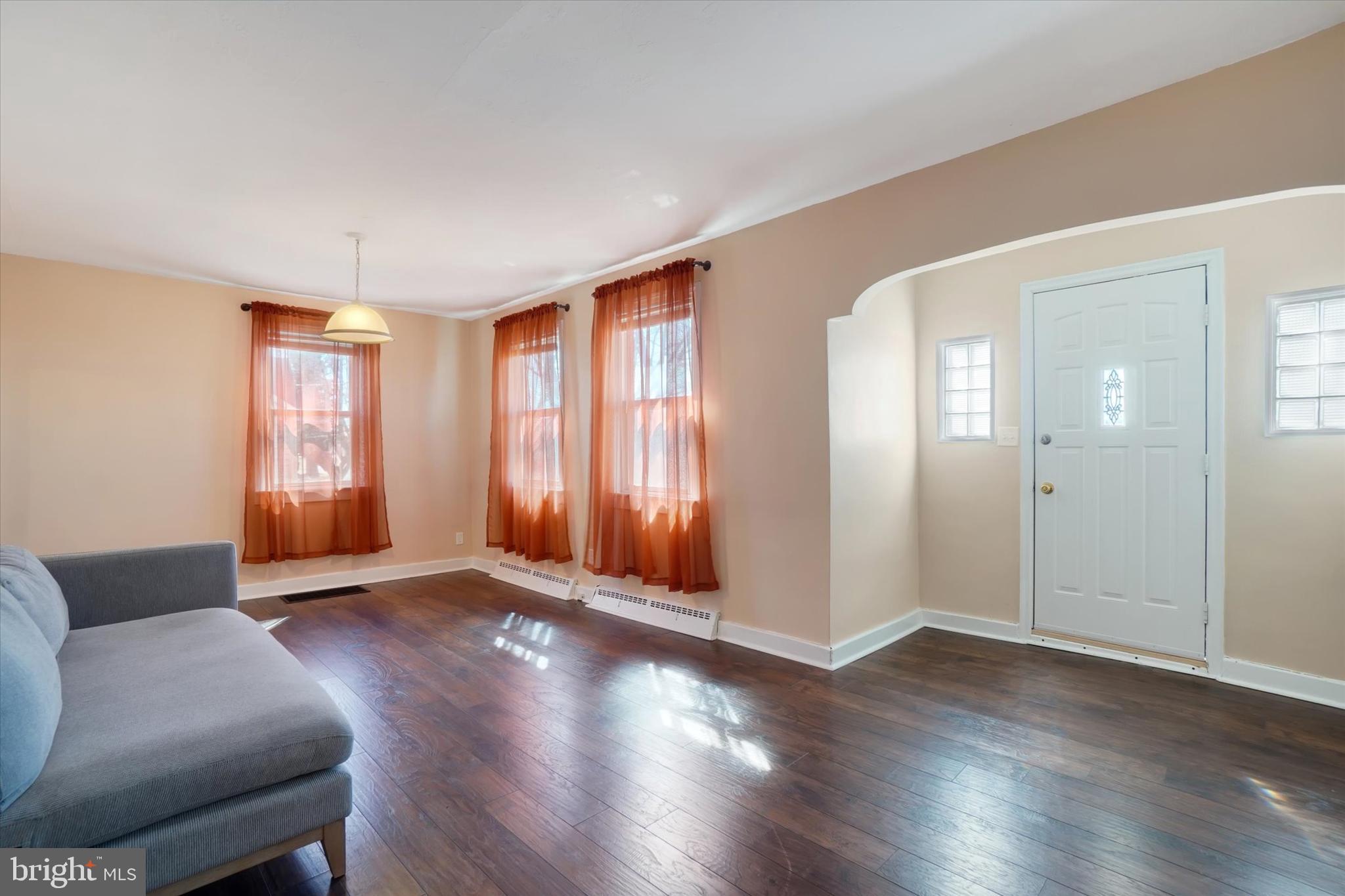 6983 Lake Road York, PA 17403 - Photo 8 of 28 a view of an empty room with window and wooden floor