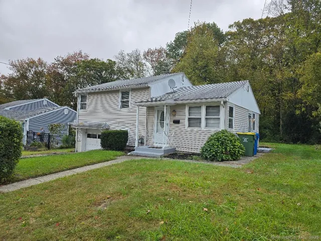 a view of a yard in front of a house