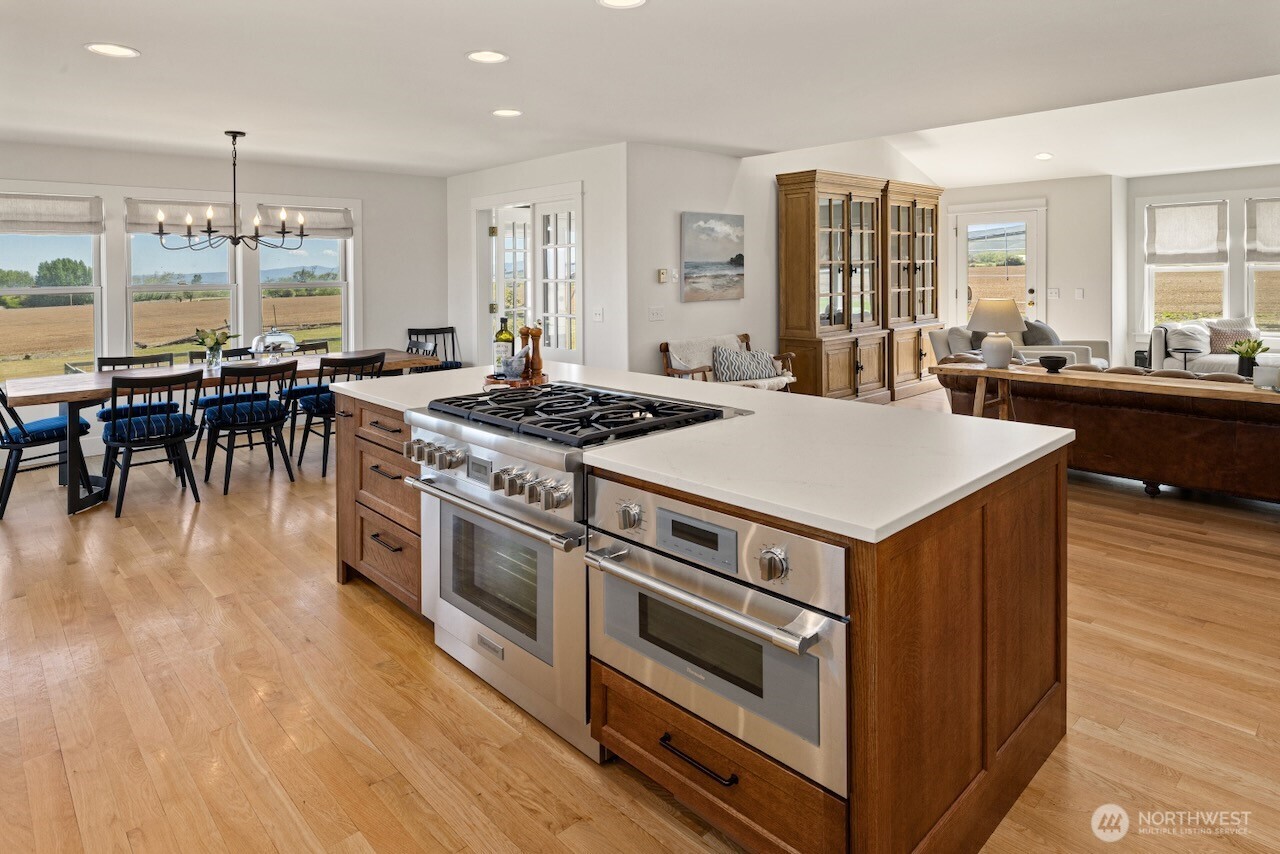 3920 Weaver Road Ellensburg, WA 98926 - Photo 11 of 40 a kitchen with a stove and a table