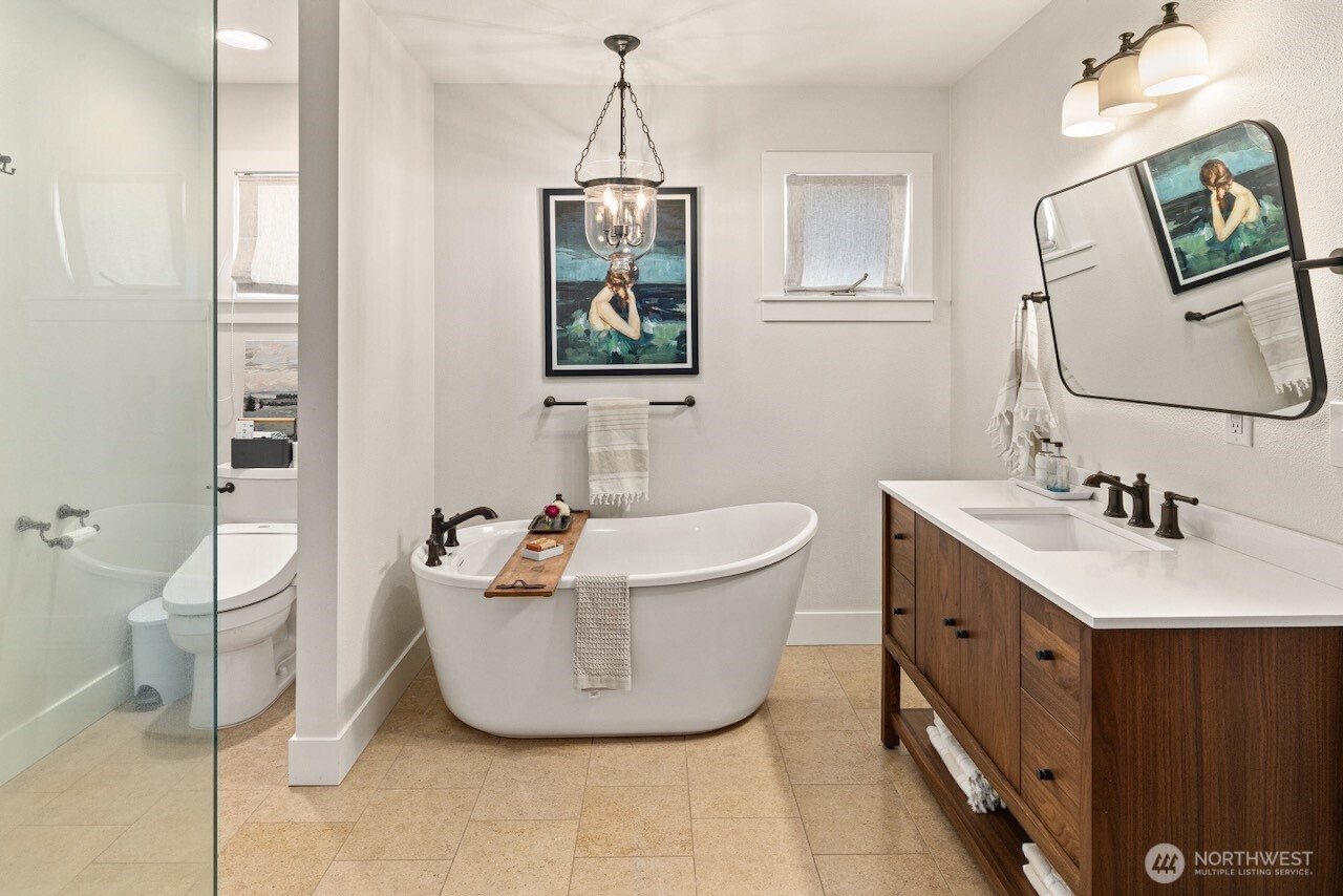 3920 Weaver Road Ellensburg, WA 98926 - Photo 17 of 40 a bathroom with a sink mirror and toilet