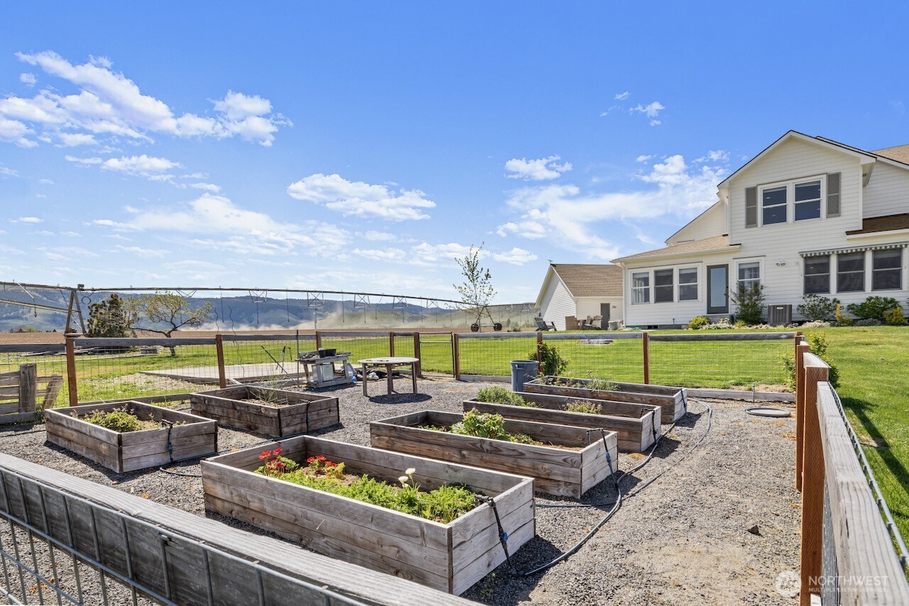 3920 Weaver Road Ellensburg, WA 98926 - Photo 29 of 40 a view of swimming pool with outdoor seating and city view