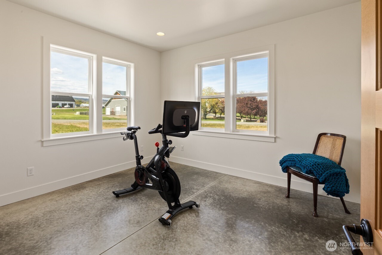 3920 Weaver Road Ellensburg, WA 98926 - Photo 35 of 40 a view of a workspace with furniture and a window