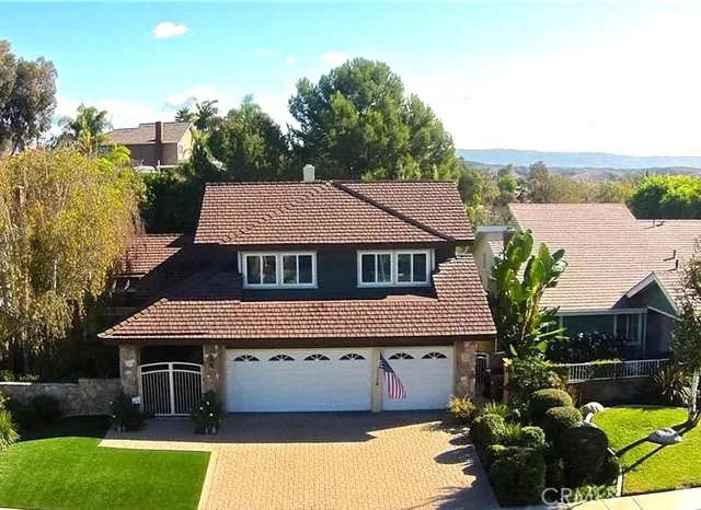 a aerial view of a house with a garden