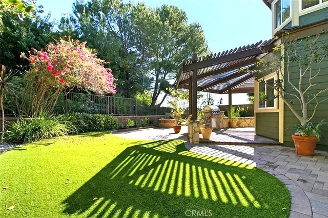 a view of swimming pool with a patio