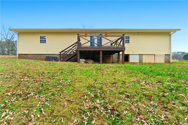 a view of a house with a big yard