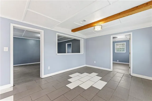 a view of livingroom with kitchen