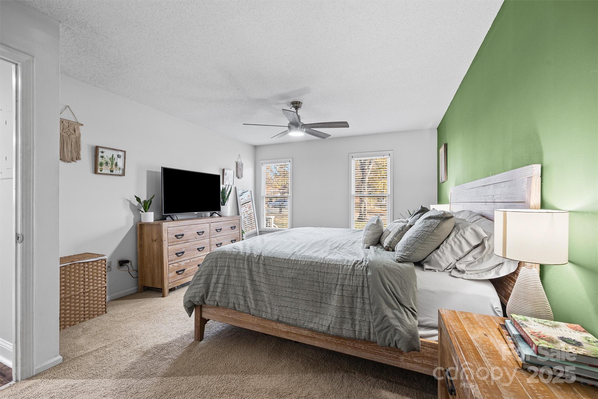 521 Rabun Circle Rock Hill, SC 29730 - Photo 13 of 28 a bedroom with a bed and a flat screen tv