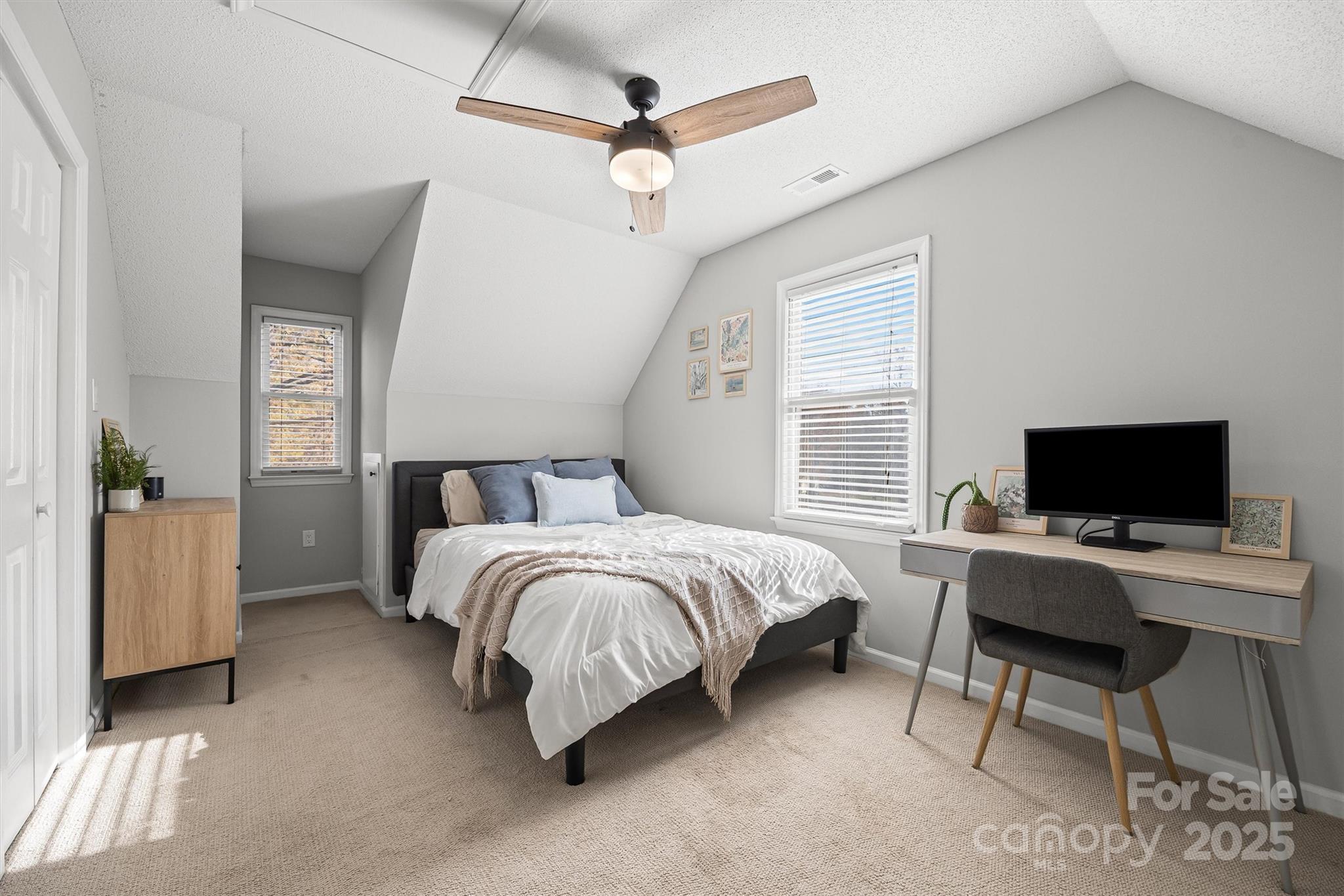 521 Rabun Circle Rock Hill, SC 29730 - Photo 16 of 28 a bedroom with a bed and a desk