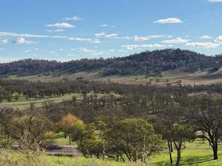 a view of a lake with a mountain in the background