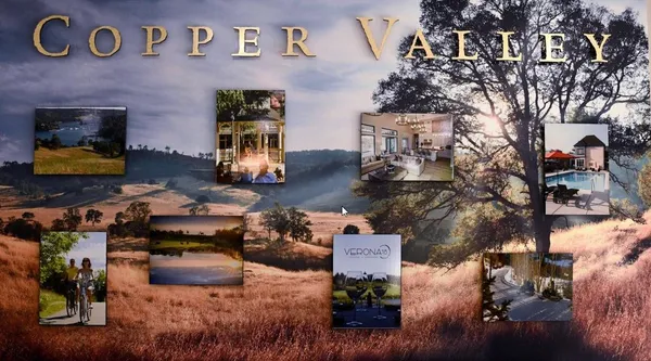 an aerial view of a house with swimming pool outdoor seating