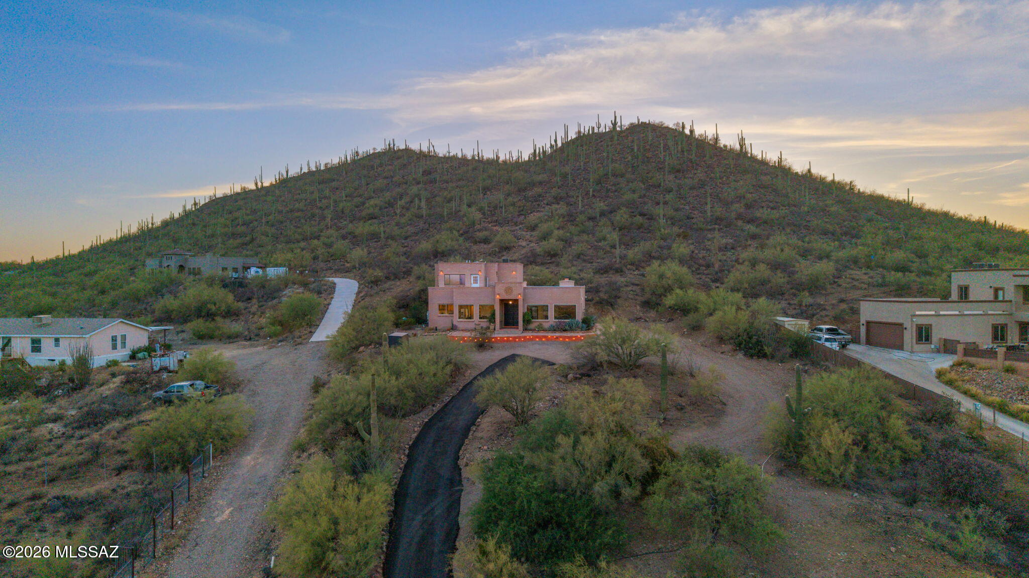 4210 West Mossman Road Tucson, AZ 85746 - Photo 44 of 51 a view of a house with a mountain in the background