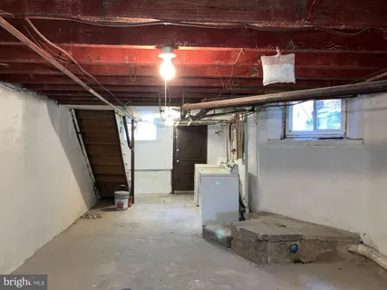 a view of storage and utility room