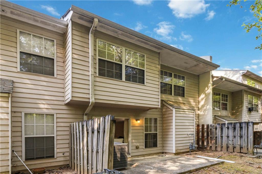 6031 Grovegate Lane Tucker, GA 30084 - Photo 23 of 26 a front view of a house
