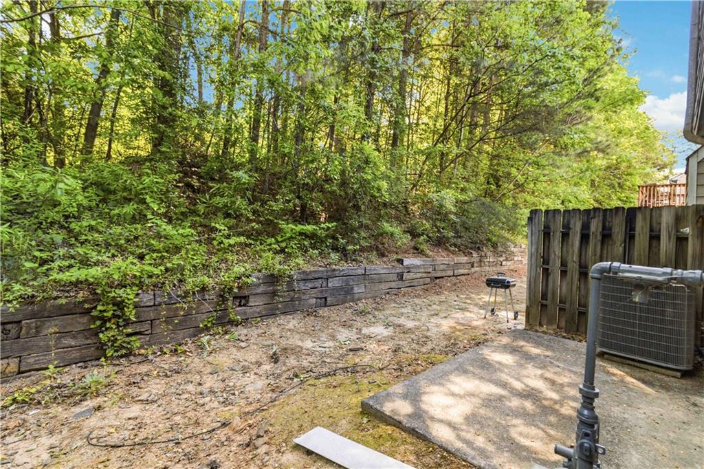 6031 Grovegate Lane Tucker, GA 30084 - Photo 26 of 26 a view of backyard with wooden fence