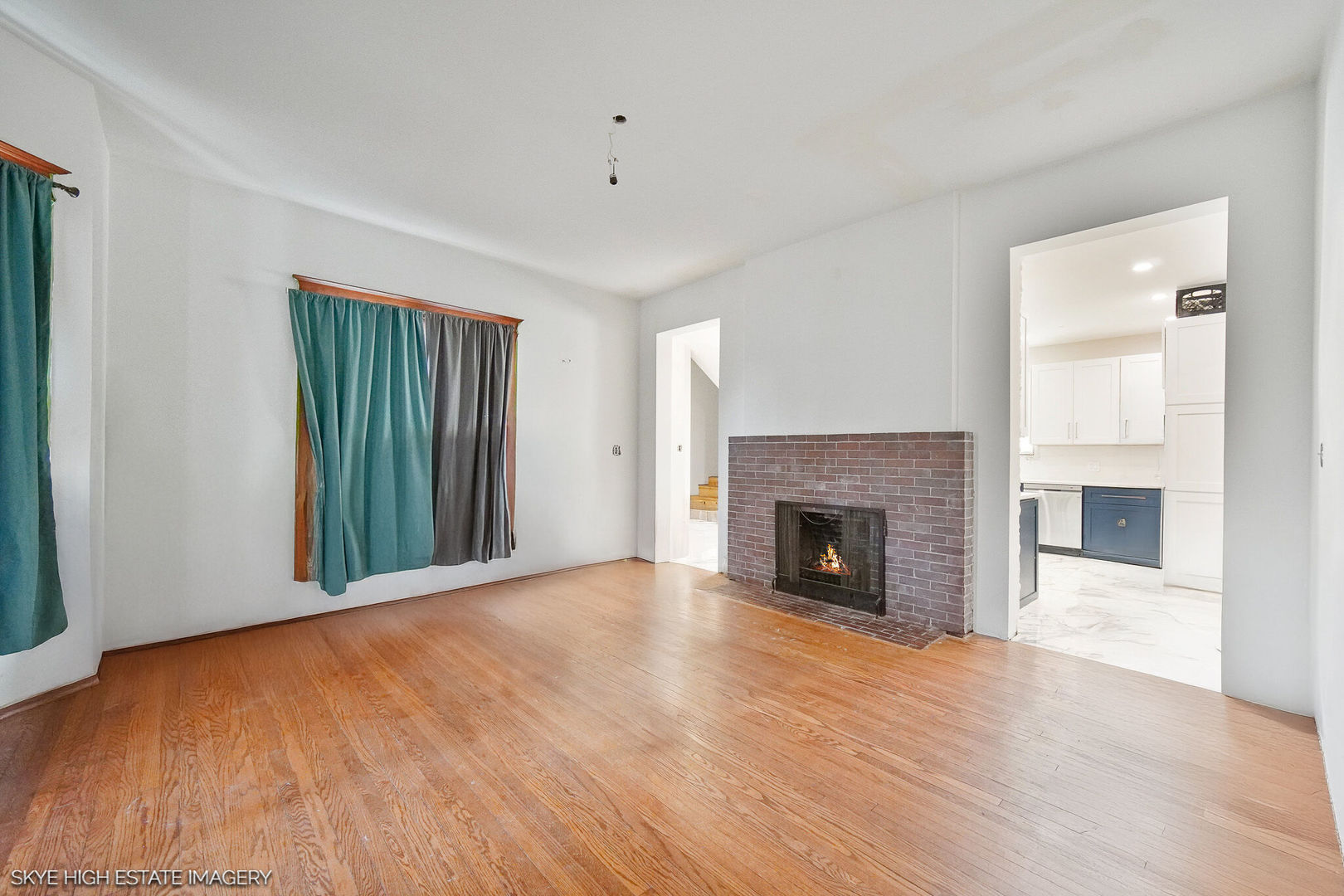 2163 Chestnut Road Homewood, IL 60430 - Photo 6 of 31 wooden floor fireplace and windows in a room