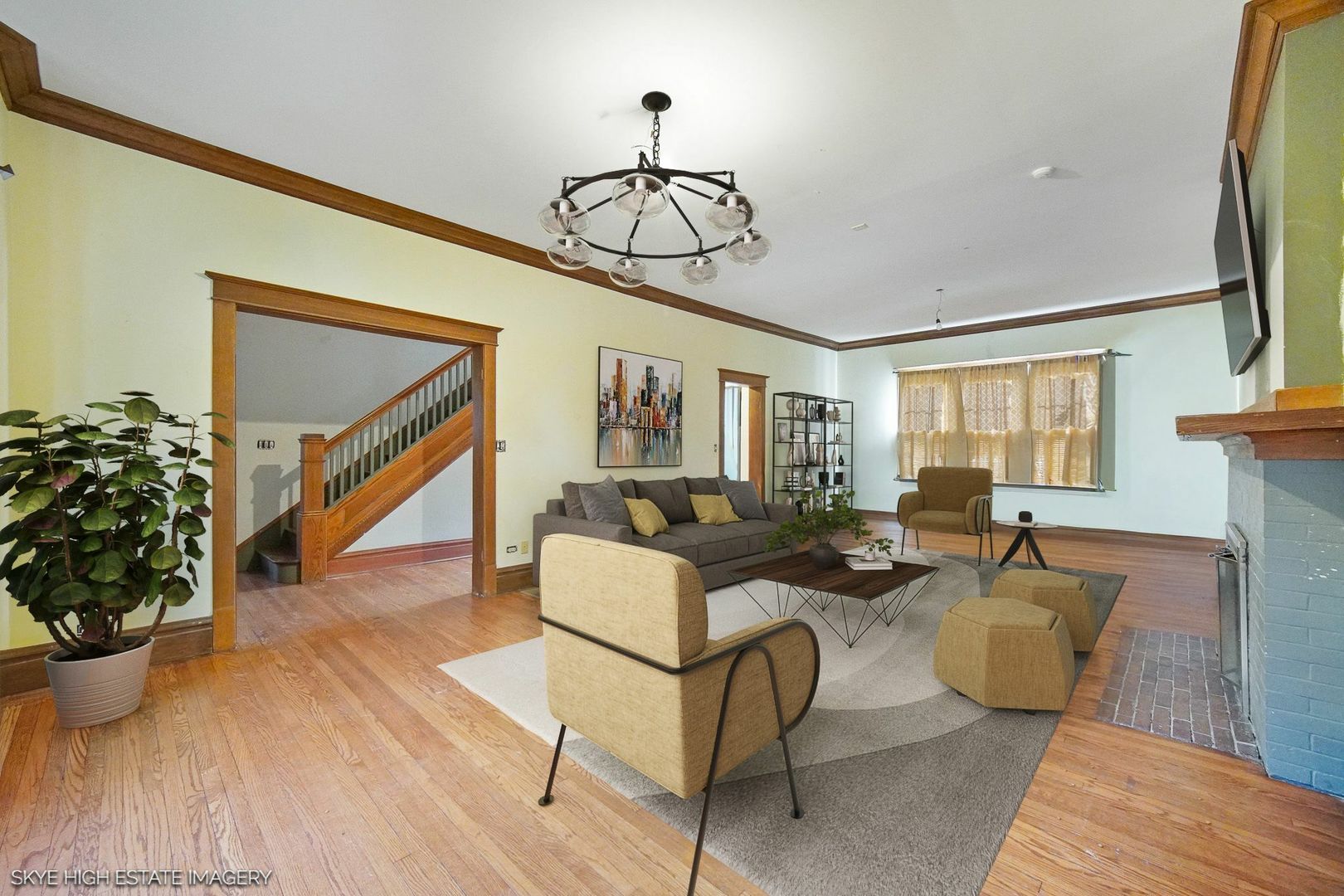 2163 Chestnut Road Homewood, IL 60430 - Photo 9 of 31 a living room with furniture a potted plant and a chandelier
