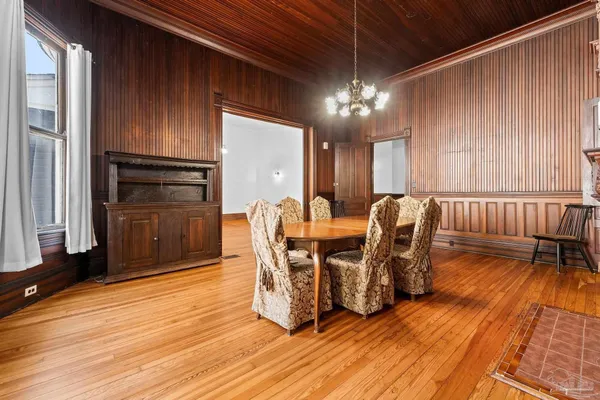 a view of a livingroom with wooden floor