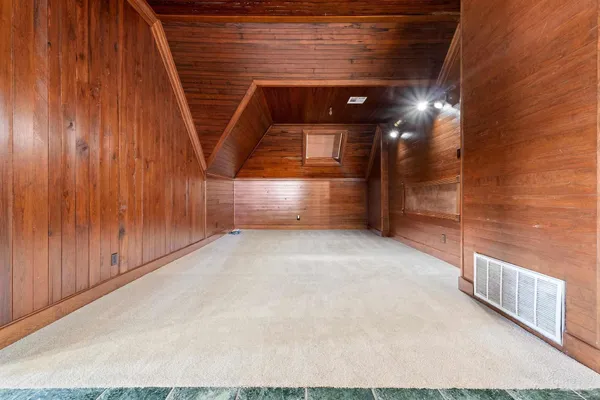 a view of a hallway with front door