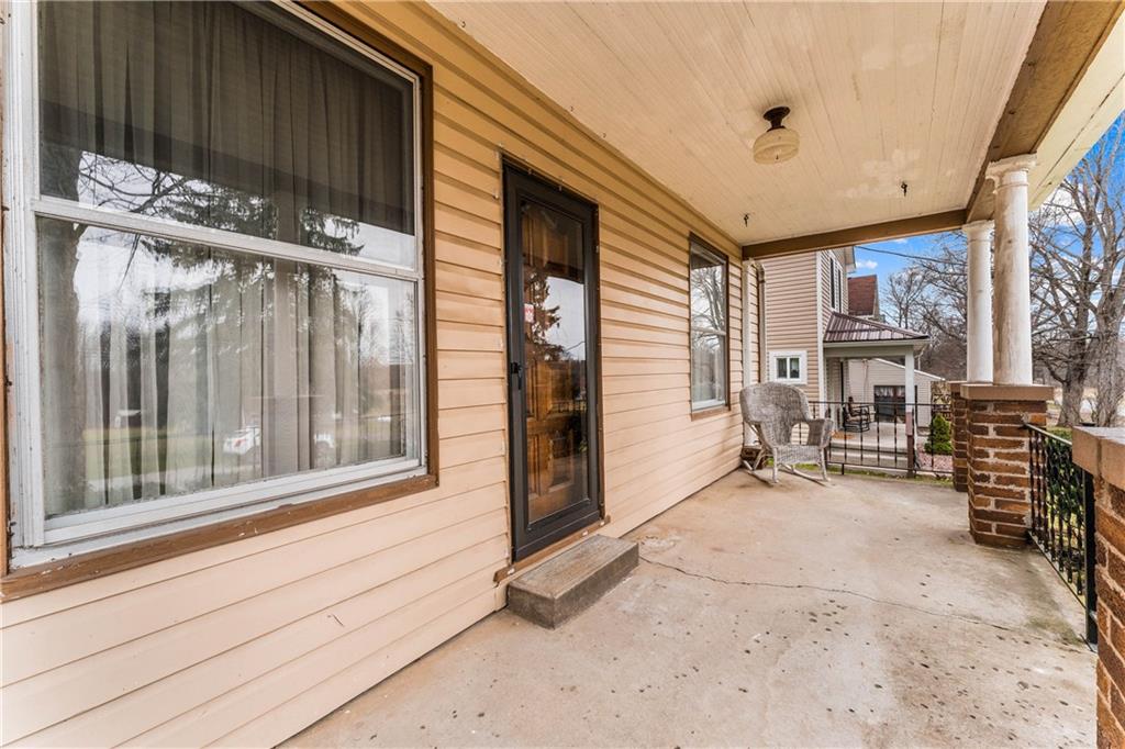 3897 Evergreen Road West Middlesex, PA 16159 - Photo 3 of 20 Imagine beautiful days relaxing on the porch