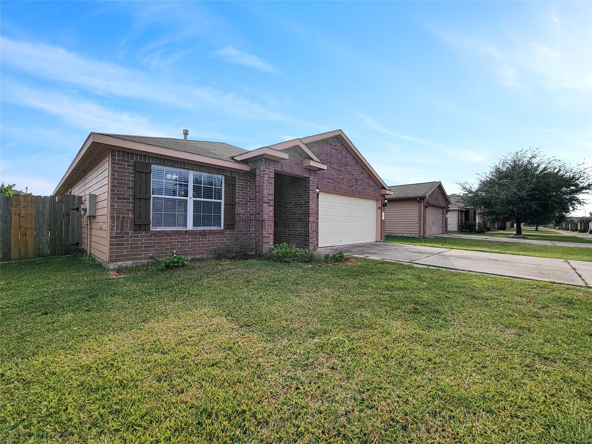 930 Paradise Road Baytown, TX 77521 - Photo 15 of 18 a view of a house with a backyard