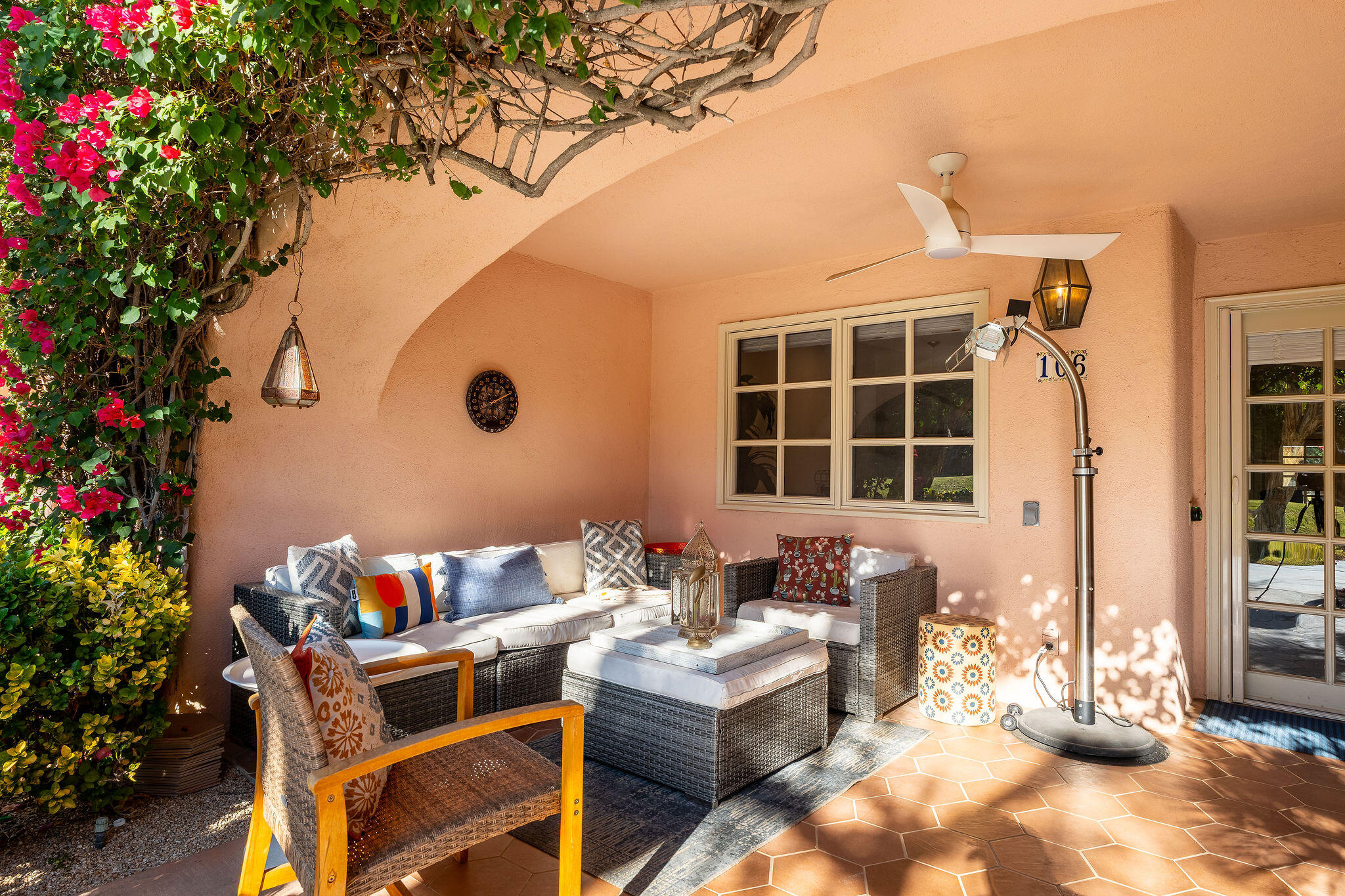 500 East Amado Road, Unit 106 Palm Springs, CA 92262 - Photo 21 of 30 a front view of a house with outdoor seating