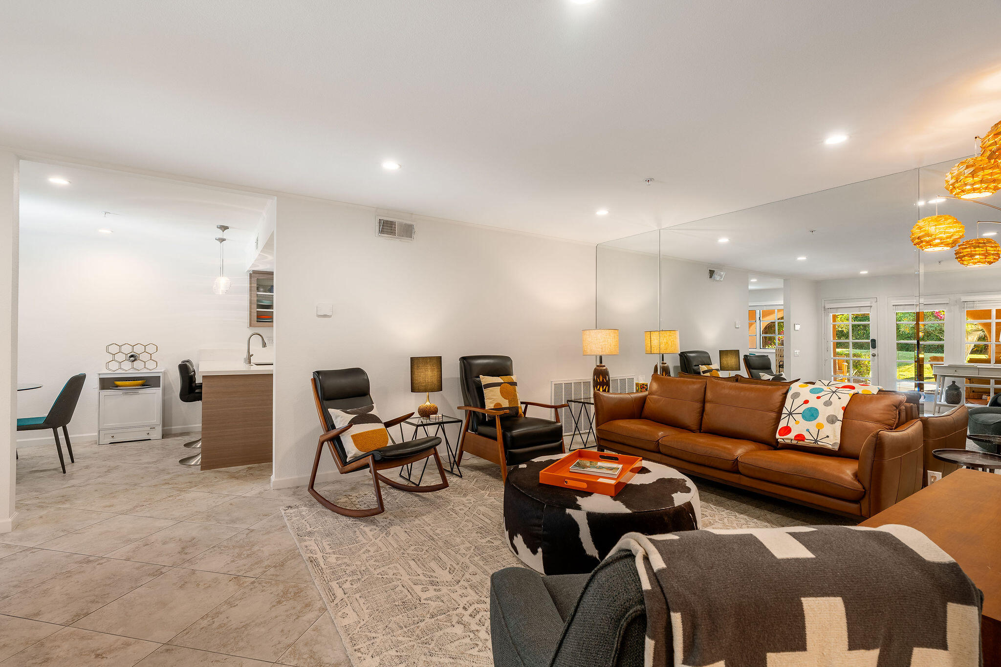 500 East Amado Road, Unit 106 Palm Springs, CA 92262 - Photo 5 of 30 a living room with furniture and a large window