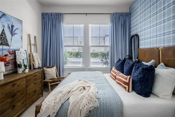 a en suite bathroom with double sink and a mirror