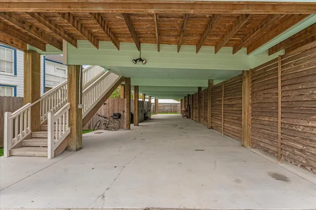 a view of an empty room with wooden walls
