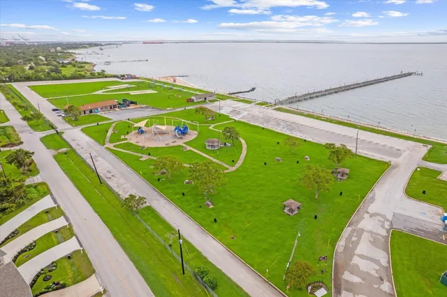 a green field with an outdoor space