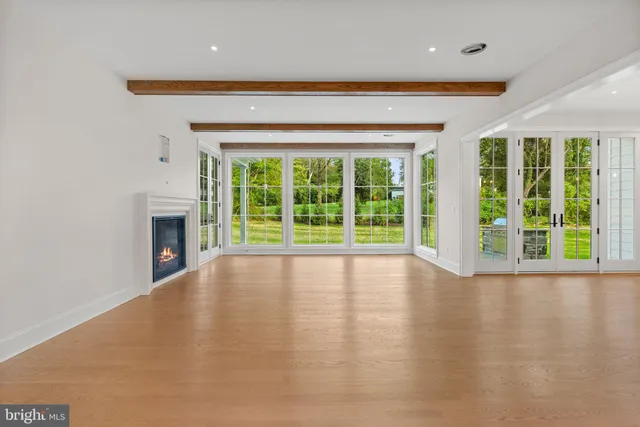 a view of a hallway with a white walls