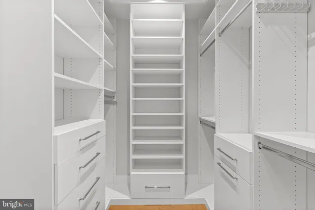 a view of a pathway both side of the house