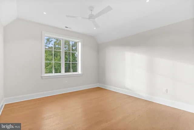 a view of a swimming pool with a lake view