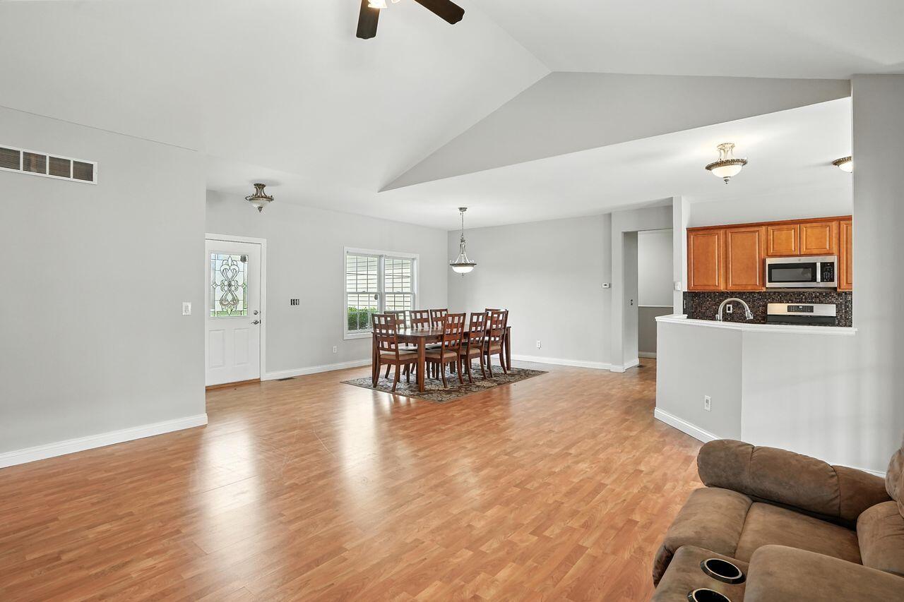 183 West 126th Place Crown Point, IN 46307 - Photo 12 of 25 a living room with furniture and a flat screen tv
