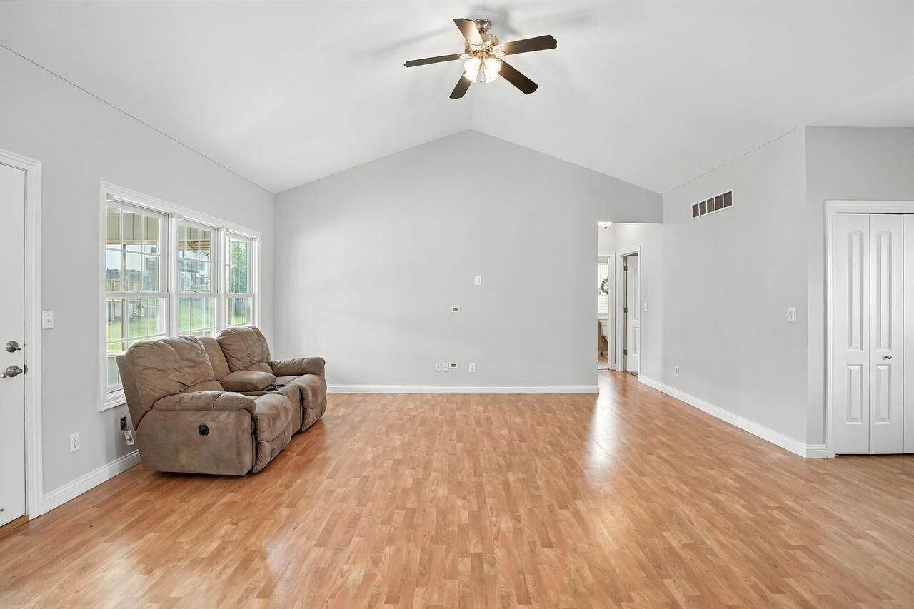 183 West 126th Place Crown Point, IN 46307 - Photo 14 of 25 a living room with furniture and a window