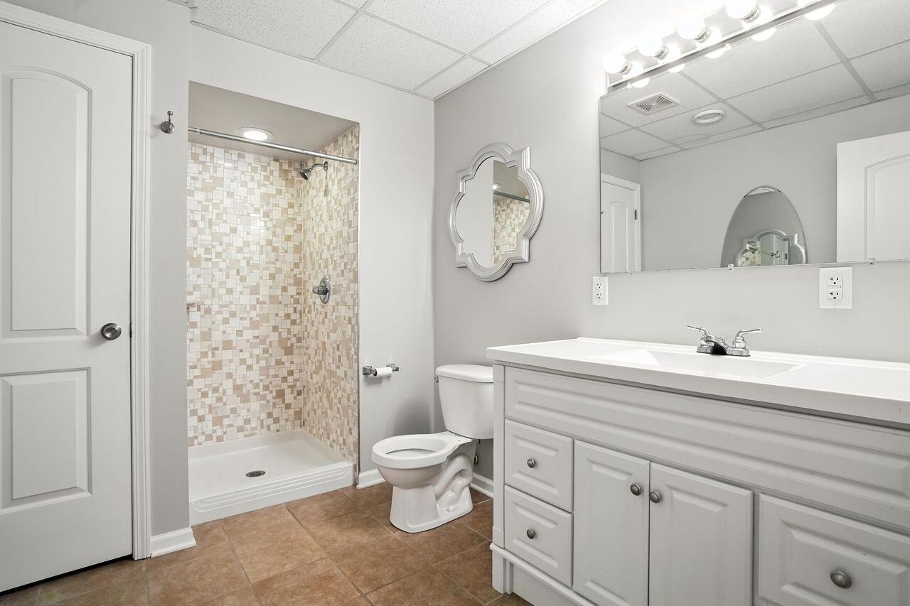 183 West 126th Place Crown Point, IN 46307 - Photo 20 of 25 a bathroom with a sink a toilet and shower