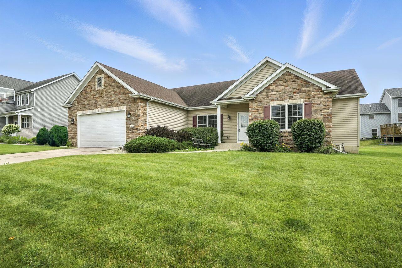 183 West 126th Place Crown Point, IN 46307 - Photo 2 of 25 a front view of a house with a yard