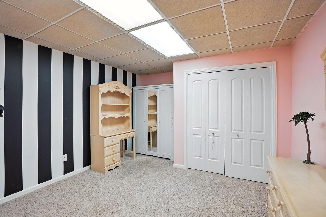 183 West 126th Place Crown Point, IN 46307 - Photo 21 of 25 a view of an empty room with a fireplace