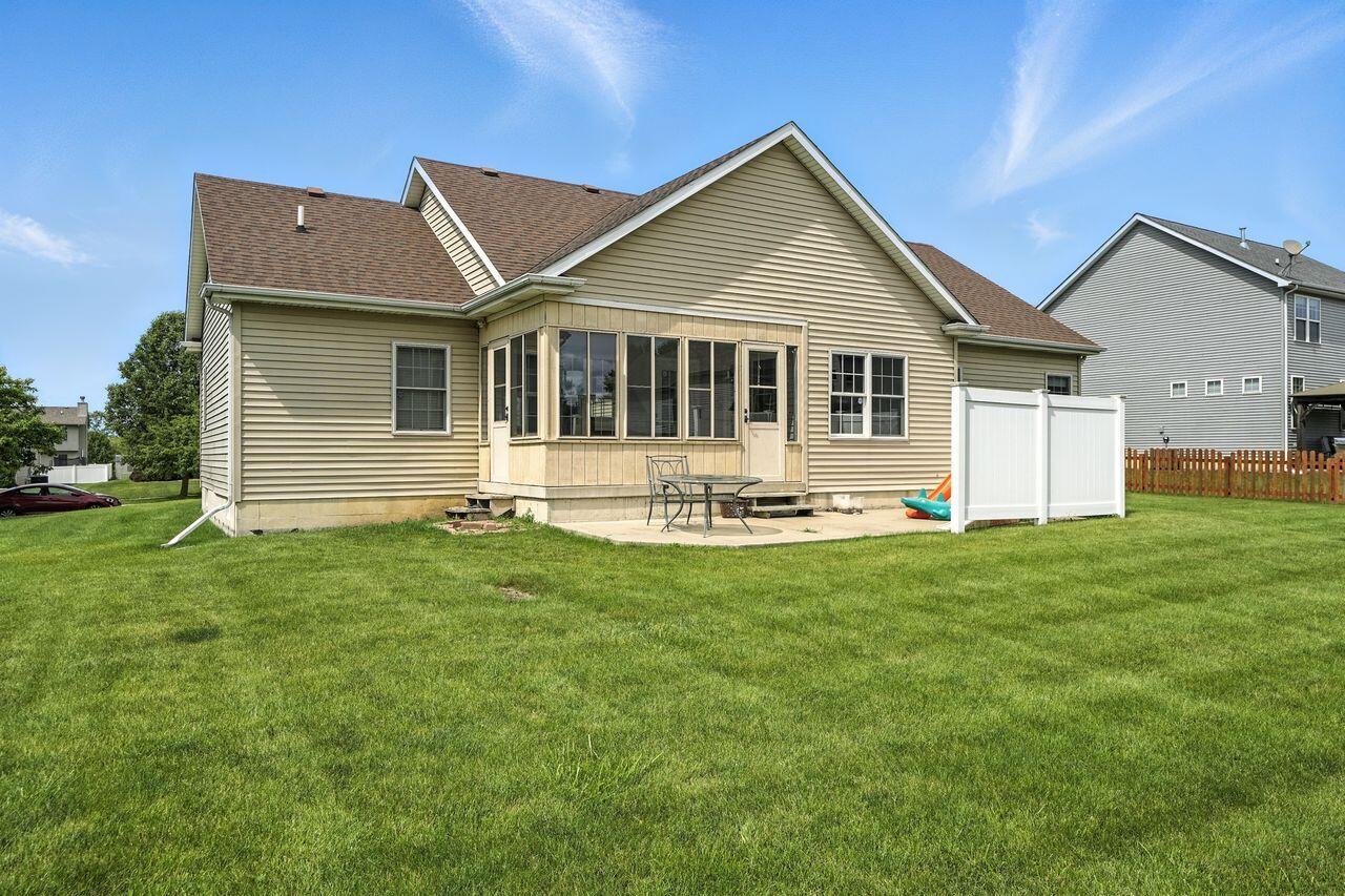 183 West 126th Place Crown Point, IN 46307 - Photo 23 of 25 a front view of house with yard and porch