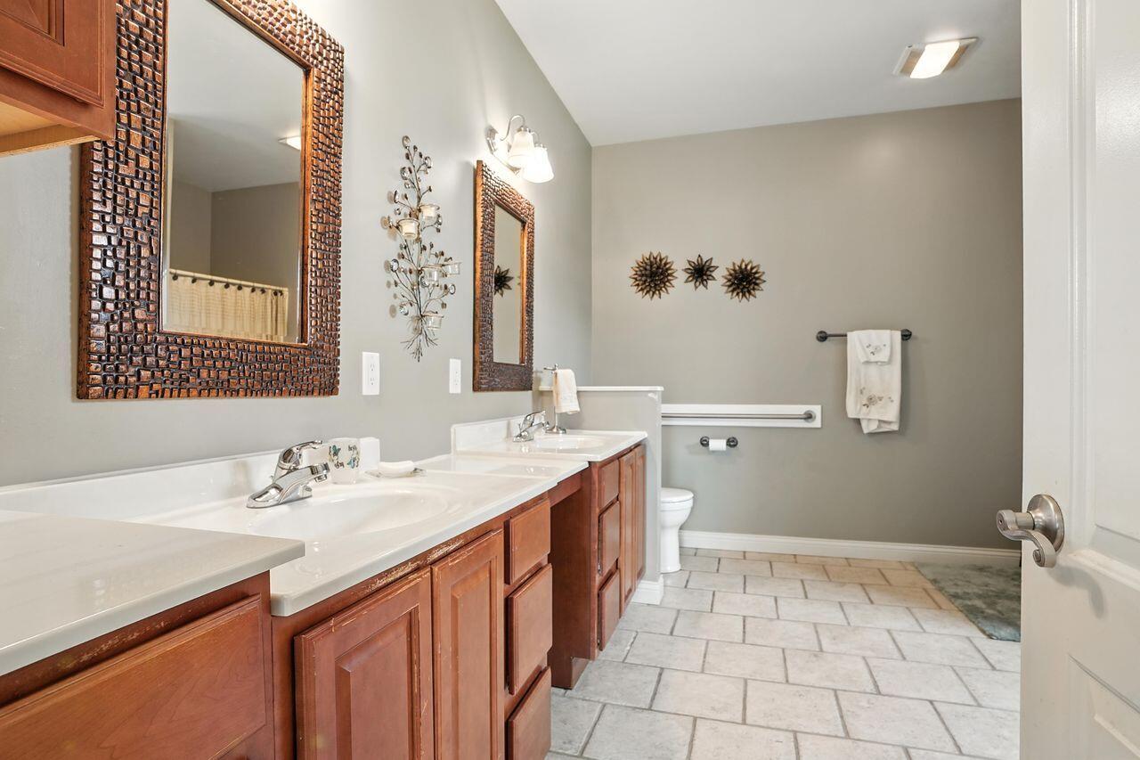 183 West 126th Place Crown Point, IN 46307 - Photo 6 of 25 a bathroom with a sink vanity and mirror